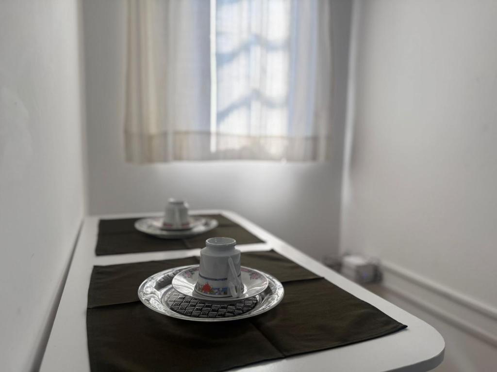 Quarto de pousada em bertioga